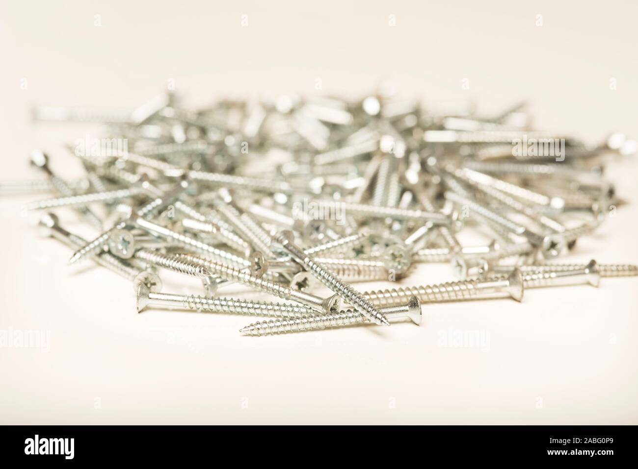 Close up shot of bright zinc plated wood screws with a countersunk