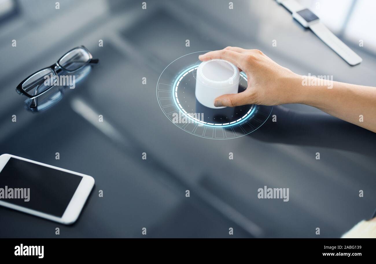 hand with control knob on interactive panel Stock Photo