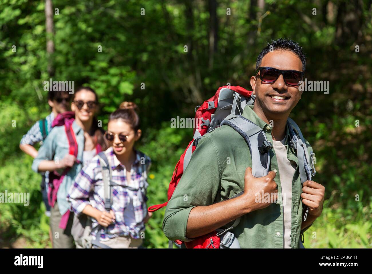 Asian man hiking in woods hi-res stock photography and images - Alamy