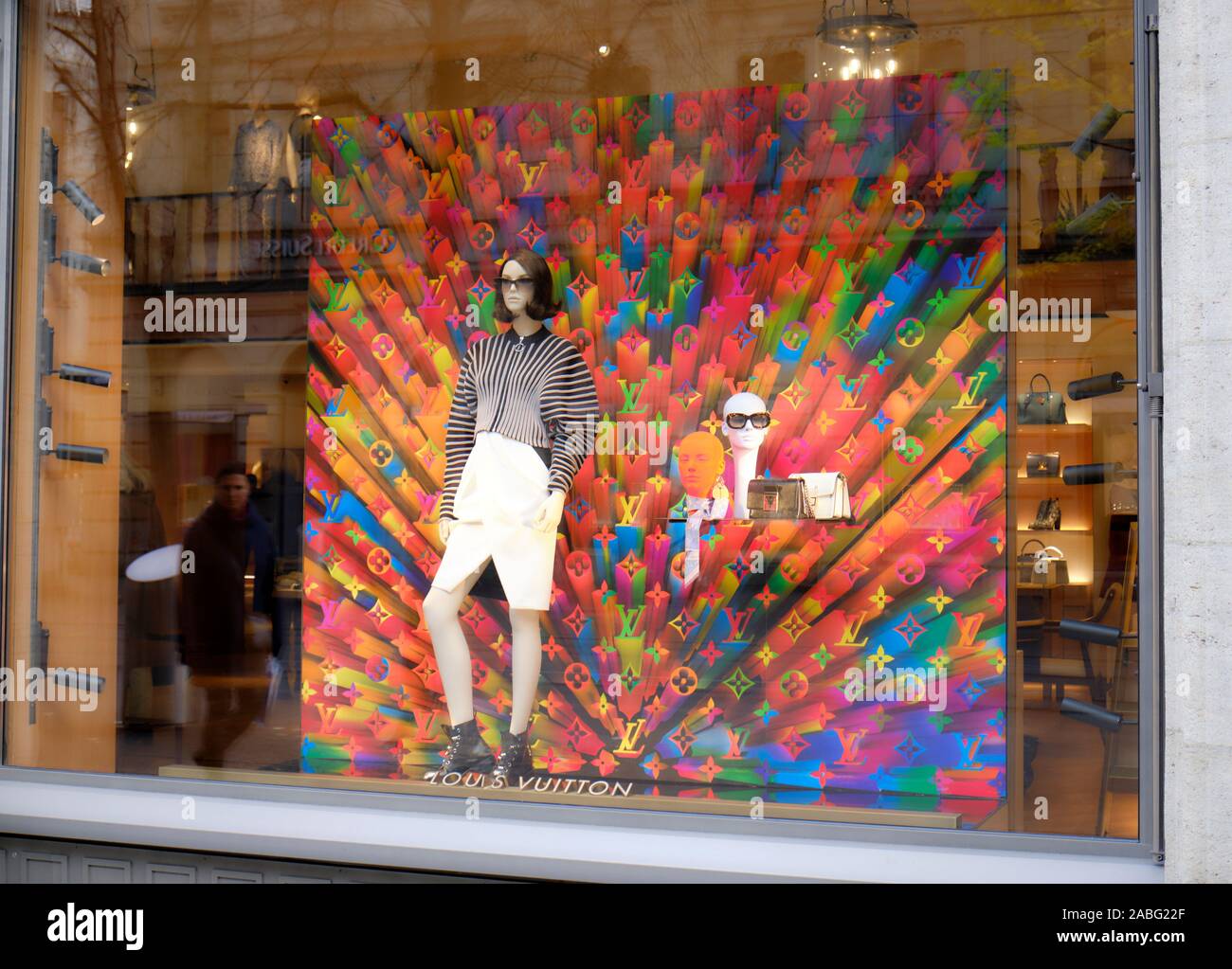Louis Vuitton colourful window display in the Zurich Bahnhofstrasse store, with people ...