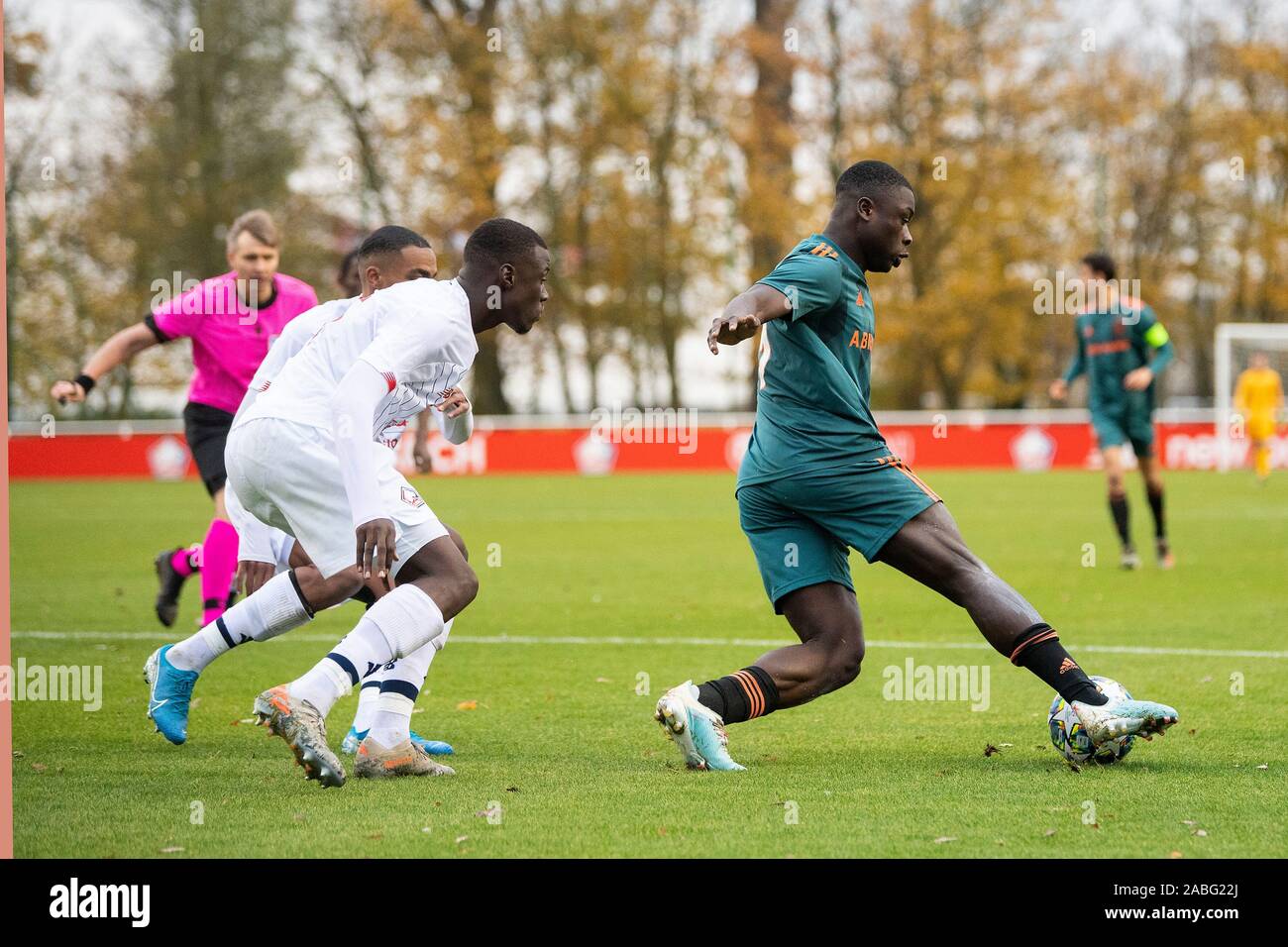 Lille, France. 27th Nov, 2019. LILLE, 27-11-2019, UEFA Youth League, season 2018/2019, LOSC Lille O19 player Abdoulaye Zakha Bangoura and Ajax O19 player Brian Brobbey during the match Lille O19 - Ajax O19 Credit: Pro Shots/Alamy Live News Stock Photo