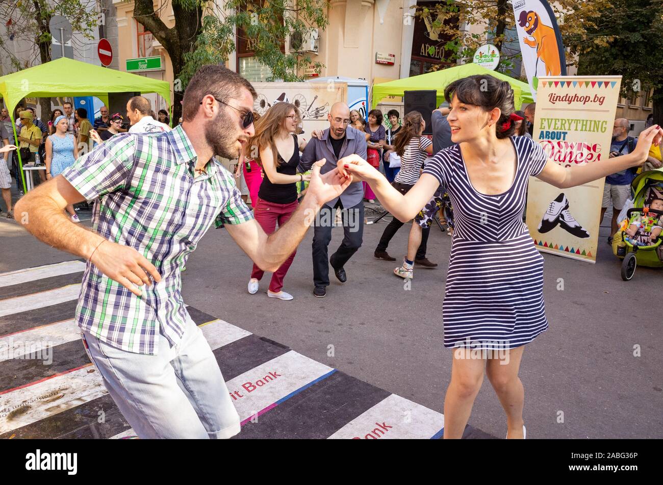 Members of a swing group dancing on the street, Sofia, Bulgaria Stock Photo