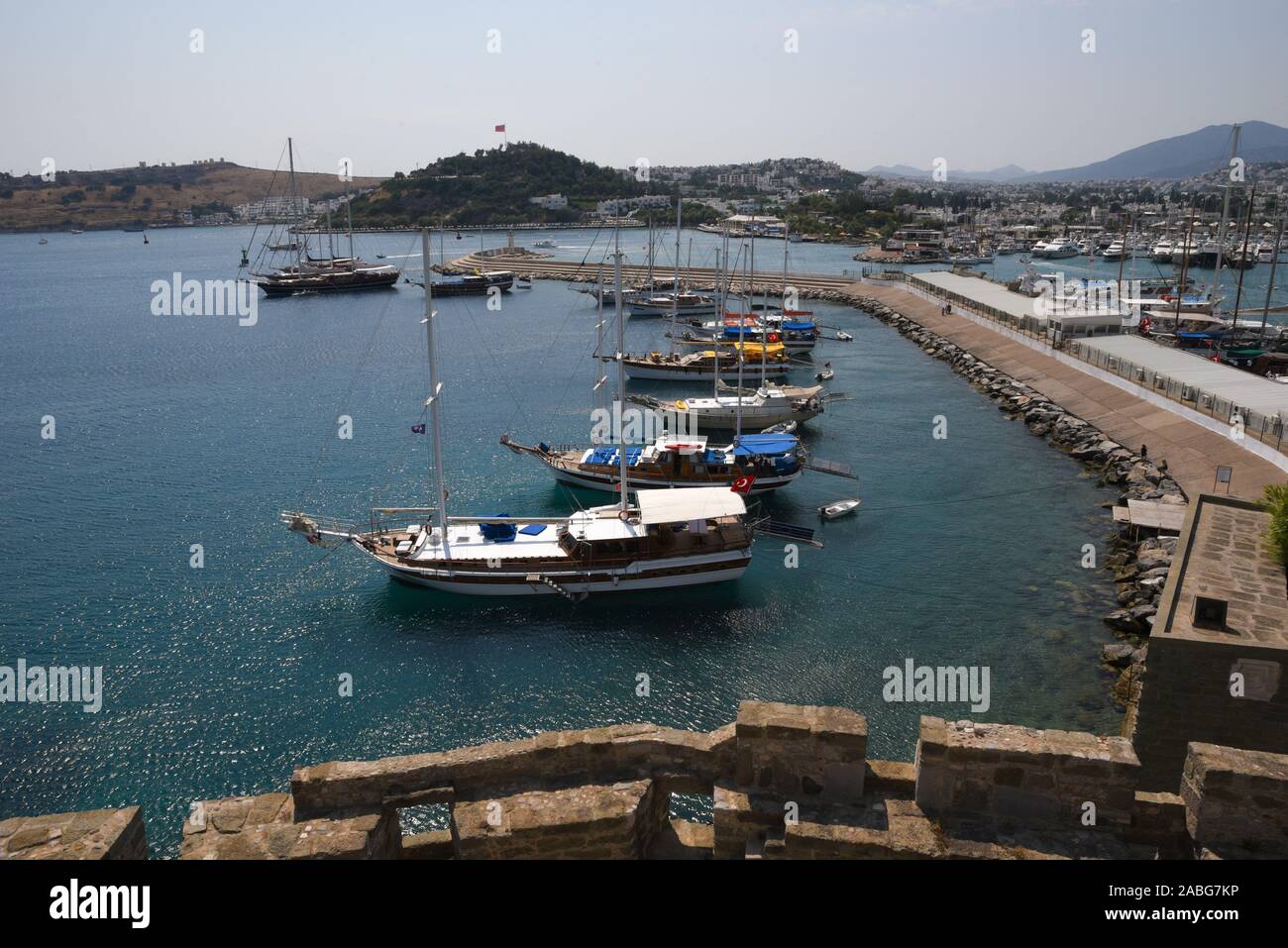 Luxury Sail Yachts at The Bodrum Marina with A part Of The Bodrum Castle from Aerial View Stock Photo