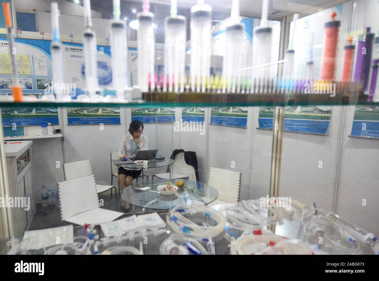 Jakarta, Indonesia. 27th Nov, 2019. A staff member works during the 2019 China Healthcare Products Expo (CHEXPO ASEAN) in the Jakarta International Expo in Central Jakarta, Indonesia, Nov. 27, 2019. China's prestigious Healthcare Products Expo (CHEXPO ASEAN) is coming back for its second time in Jakarta from Wednesday to Friday, to promote and enhance cooperation between China and Southeast Asian countries in the pharmaceutical and medical sectors after succeeding in last year's exhibition. Credit: Zulkarnain/Xinhua/Alamy Live News Stock Photo