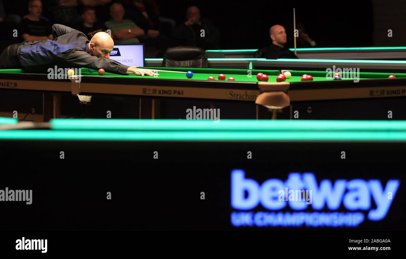 Andy Hicks in action against Mark Selby during day two of the Betway UK Championship at the York Barbican. Stock Photo