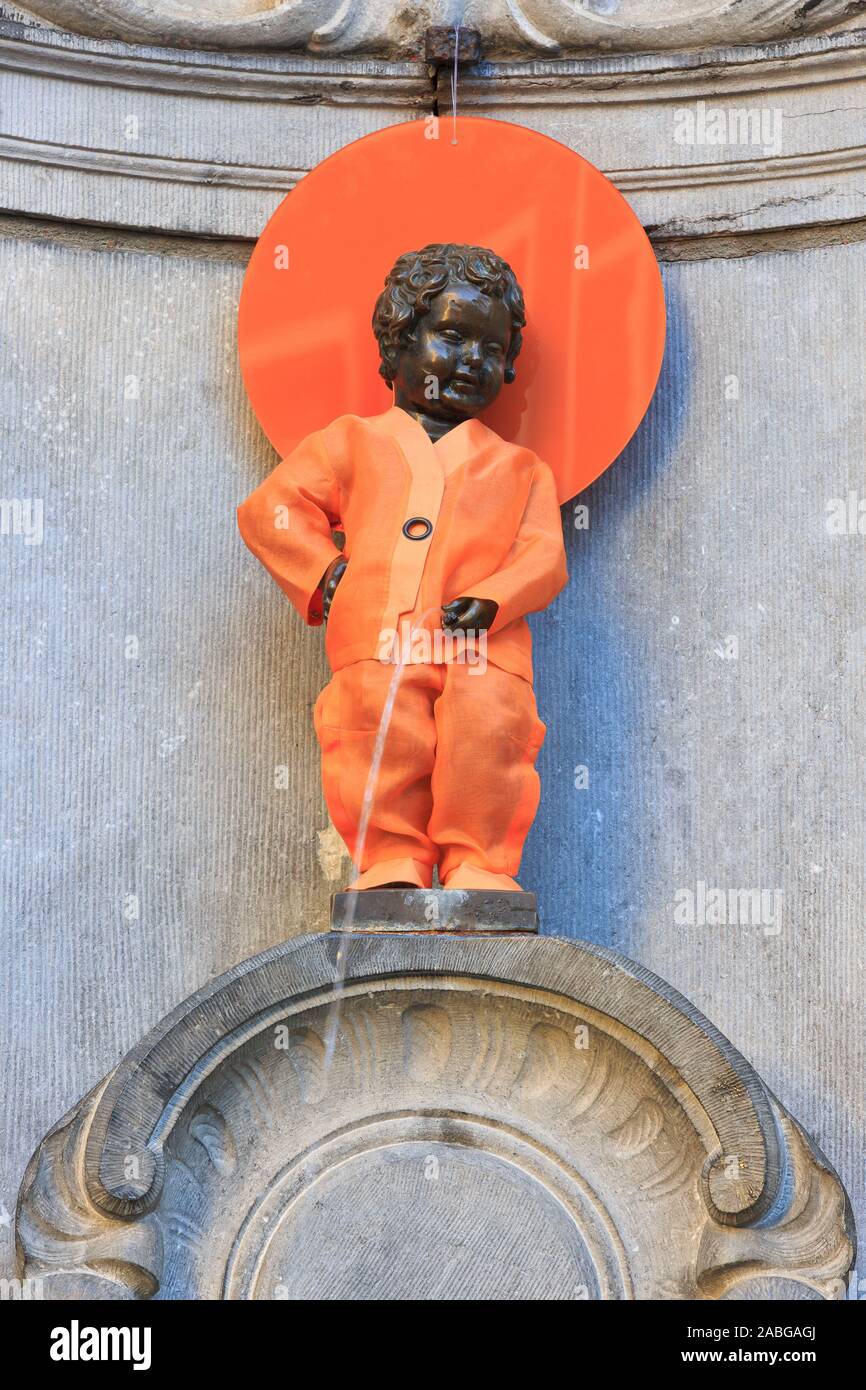 Statue of Manneken Pis dressed for "Orange The World", International