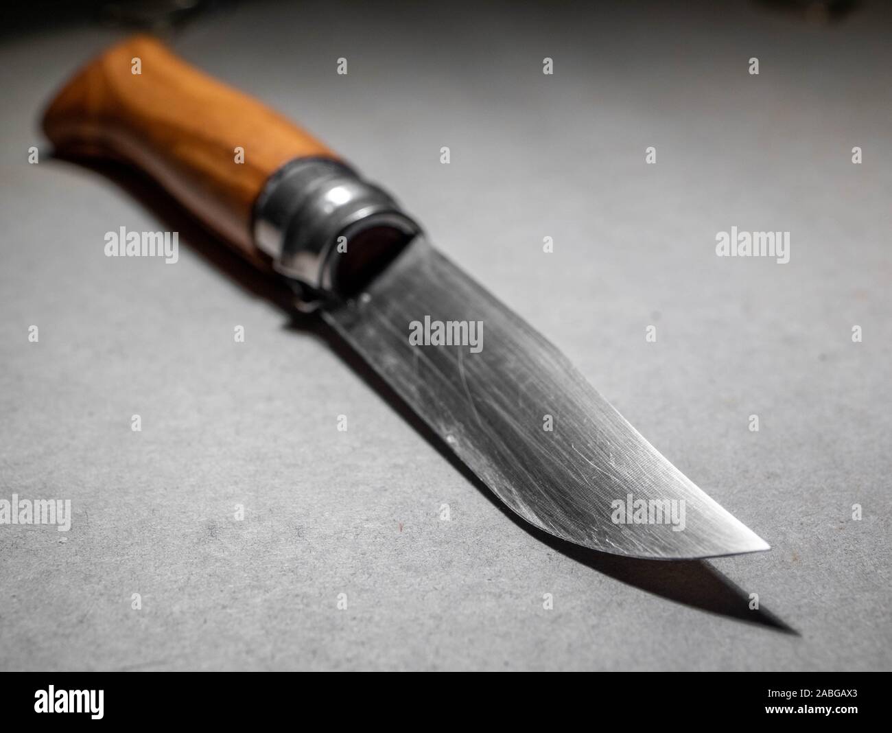 Knife with wooden handle on white background Stock Photo Alamy