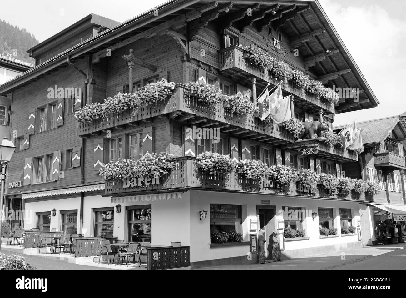 Swiss Alps: The Hotel Bären, a flower decorated wooden chalet in Adelboden in the Bernese Oberland Stock Photo
