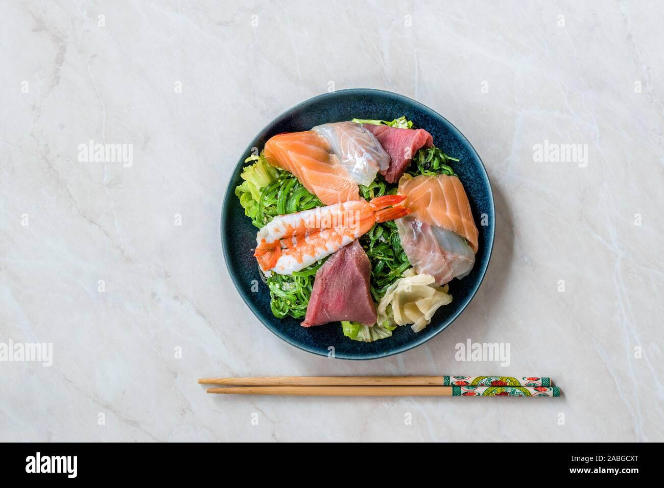 Premium Photo  Japanese poki with sashimi salmon avocado udon wakame  seaweed tuna on the old rusty wood table