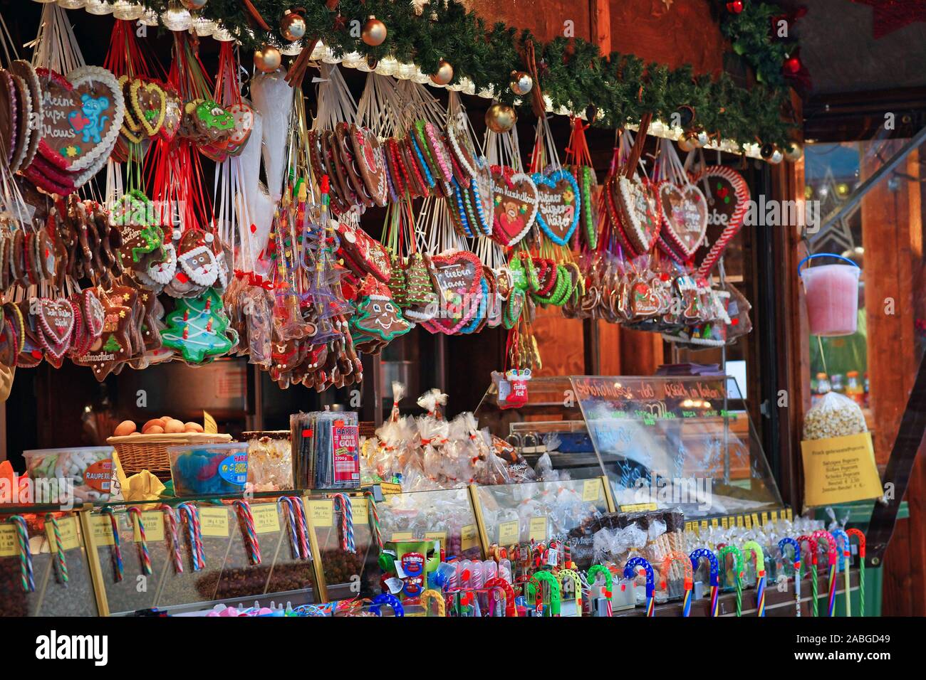 Sales booth selling colorful sweets during traditional Christmas market