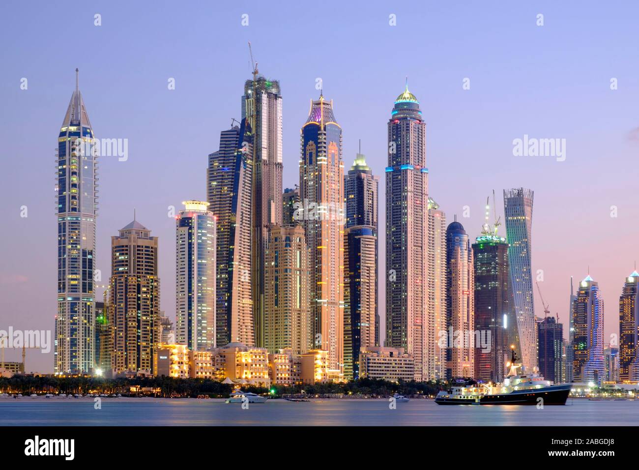 Skyline of skyscrapers at dusk  at Marina district in Dubai United Arab Emirates Stock Photo