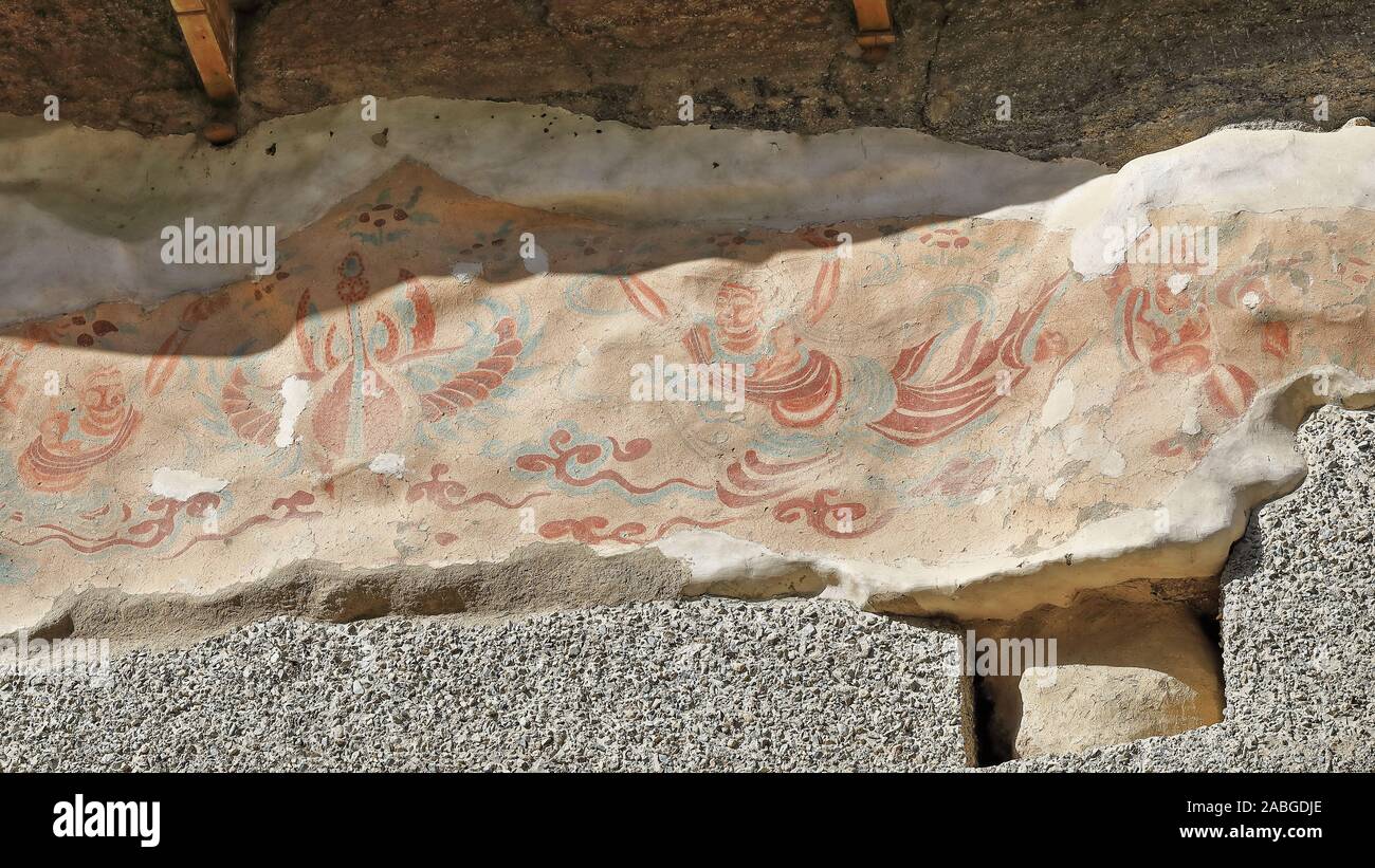 Remnants of painted frescoes-Mogao Buddhist caves exterior. Dunhuang-Gansu province-China-0613 Stock Photo