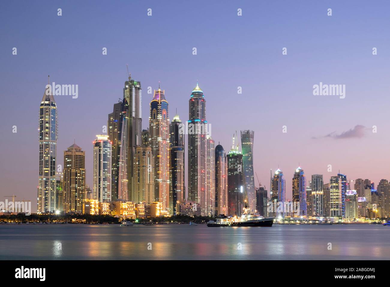 Skyline of skyscrapers at dusk  at Marina district in Dubai United Arab Emirates Stock Photo