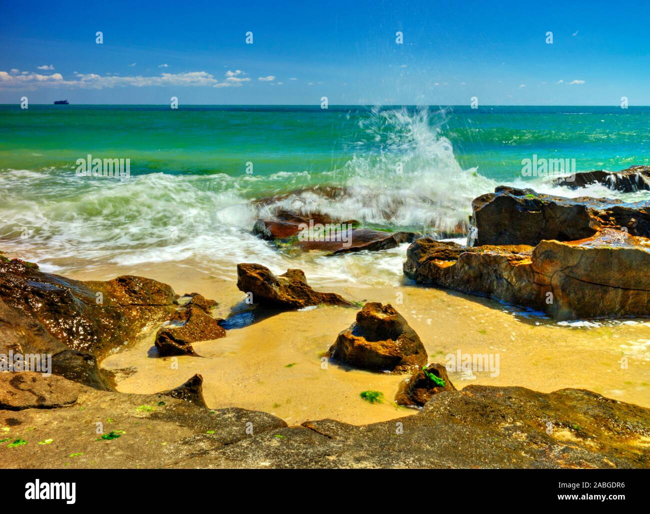 Beautiful landscape with rocks and sea waves on a sunny beach Stock ...