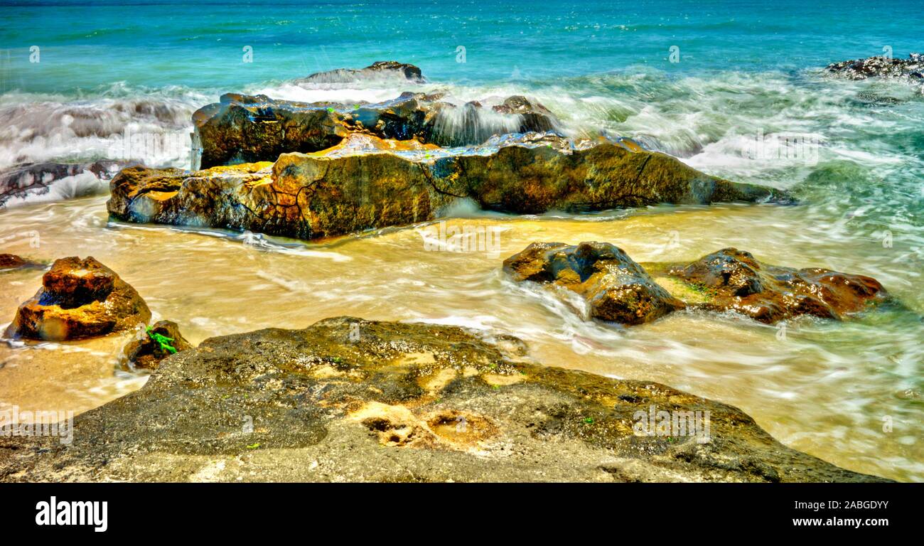 Beautiful landscape with rocks and sea waves on a sunny beach Stock ...