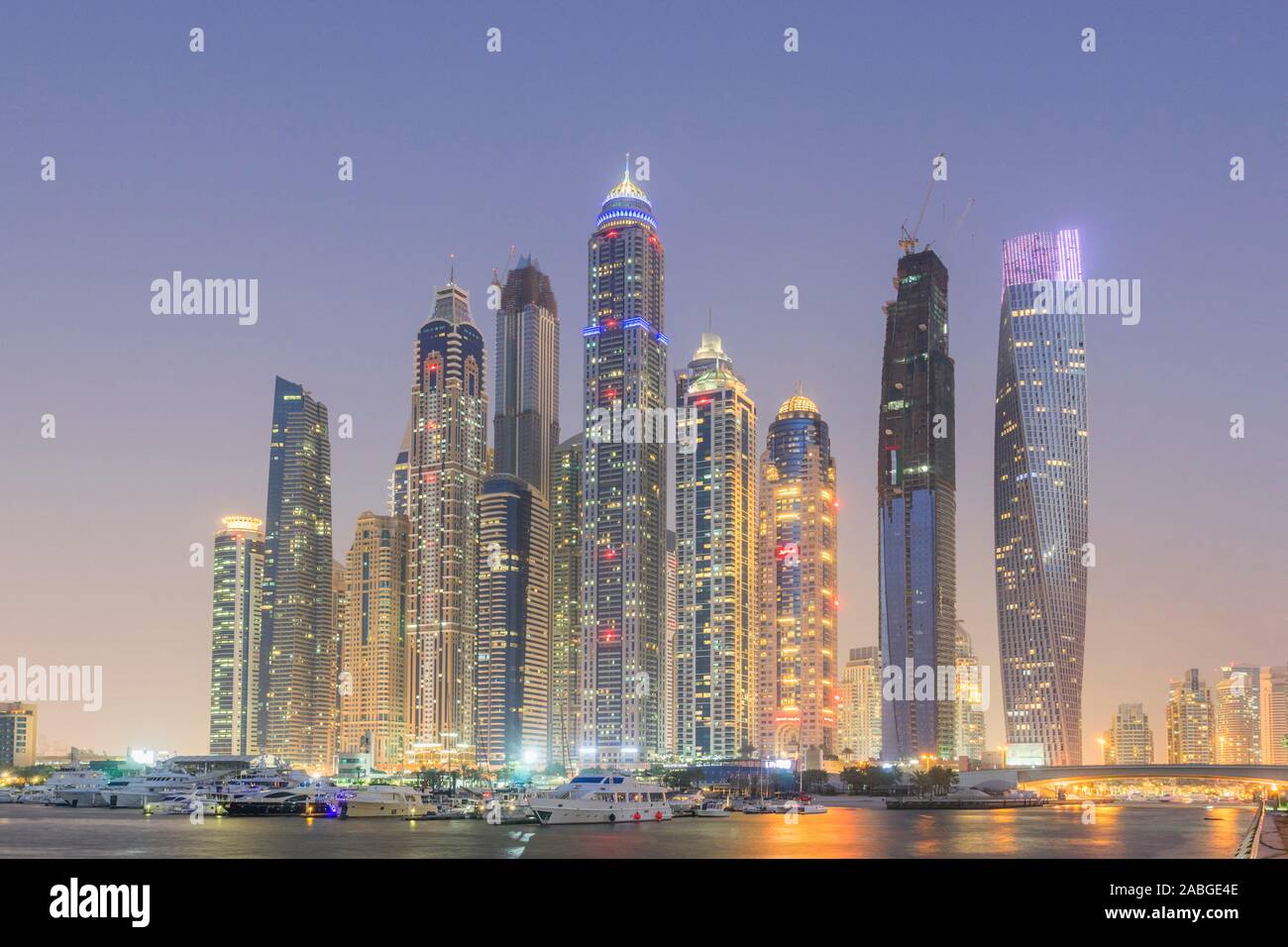 Night view of skyline of modern skyscrapers in Marina district of Dubai United Arab Emirates Stock Photo