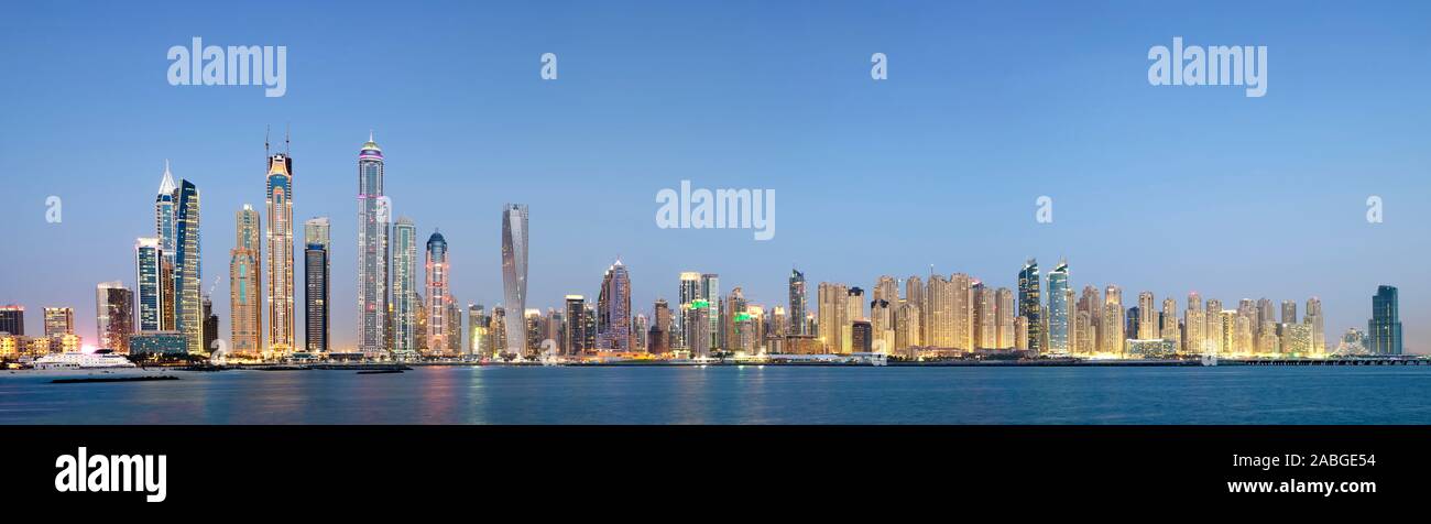Evening skyline panorama view of skyscrapers in Marina district of Dubai United Arab Emirates Stock Photo