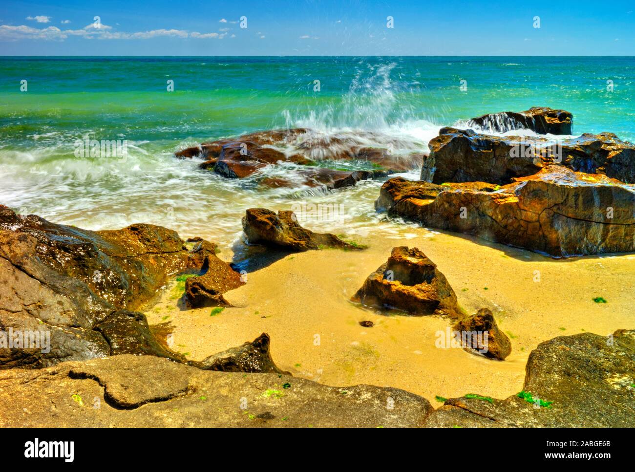 Beautiful landscape with rocks and sea waves on a sunny beach Stock ...