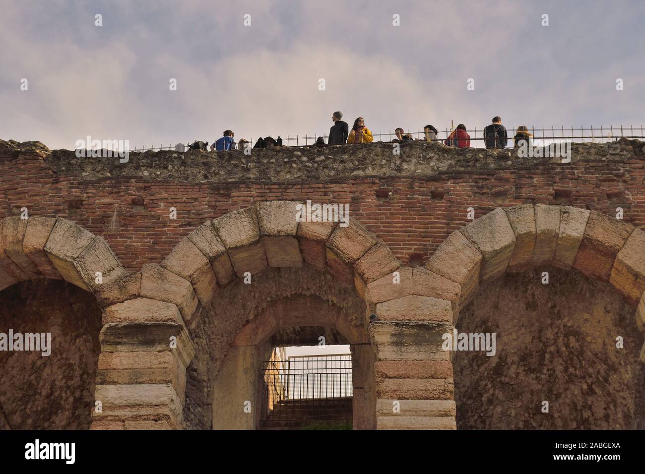 Verona Italy people walking on the top of the Arena Stock Photo