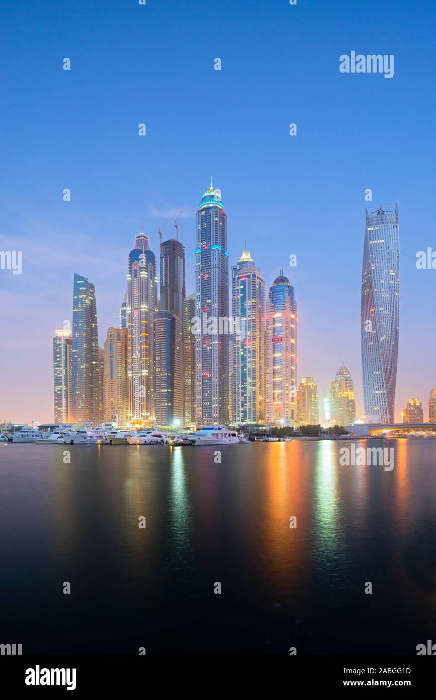 Modern skyline at night of high rise skyscrapers in Marina district of Dubai United Arab Emirates Stock Photo