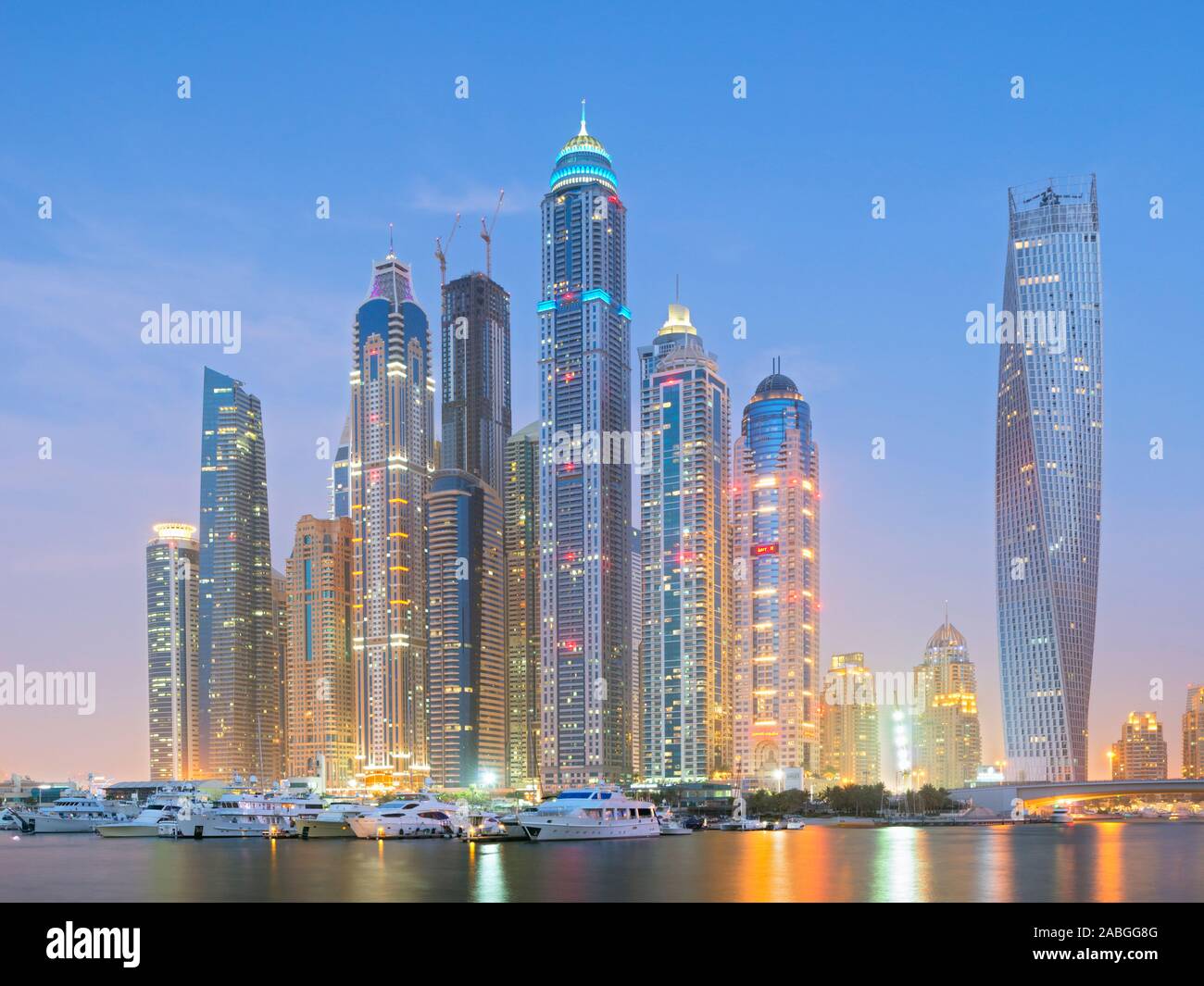 Modern skyline at night of high rise skyscrapers in Marina district of Dubai United Arab Emirates Stock Photo