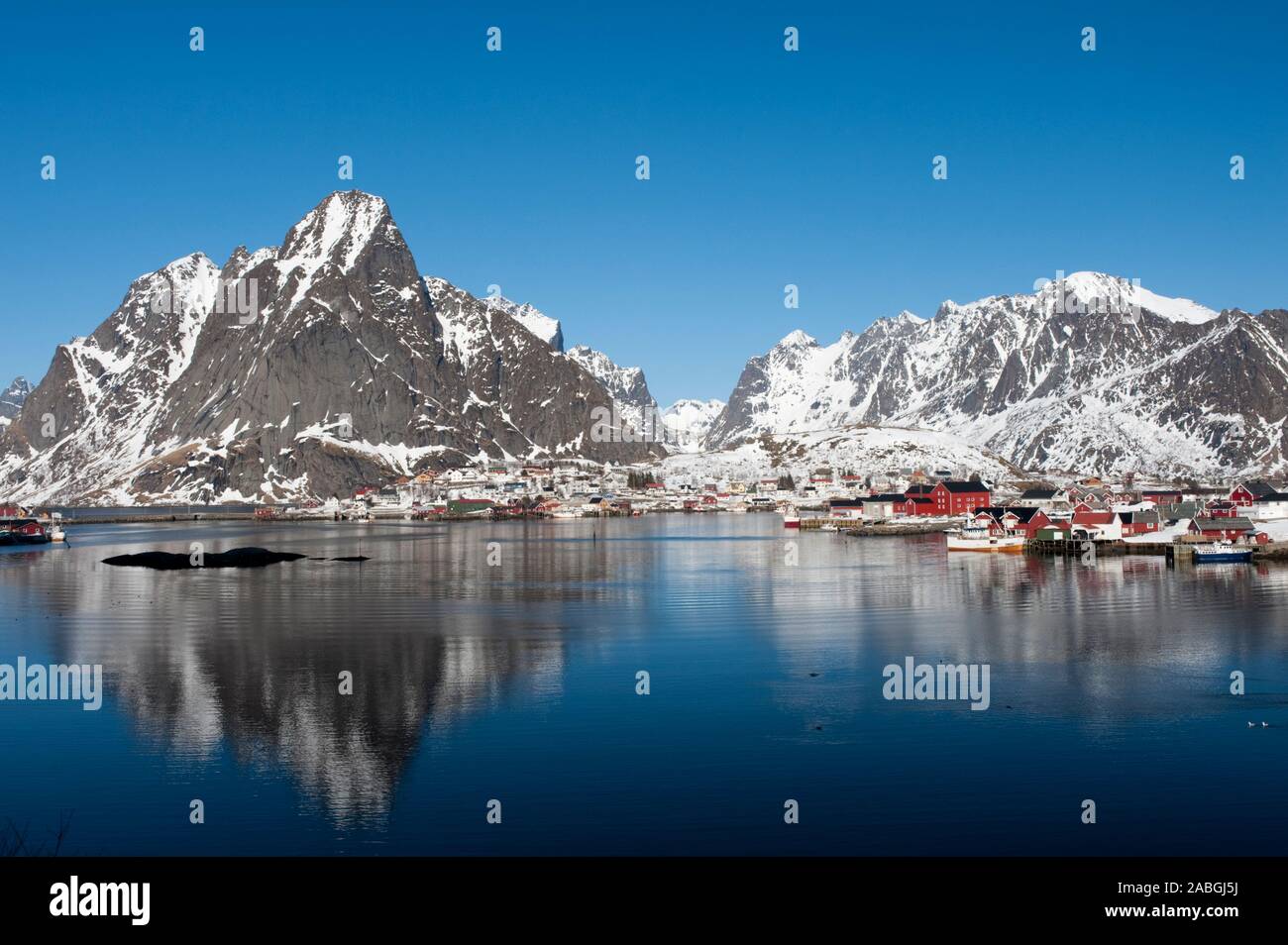 View of harbour and lagoon at village of Reine in Lofoten Islands in northern Norway Stock Photo