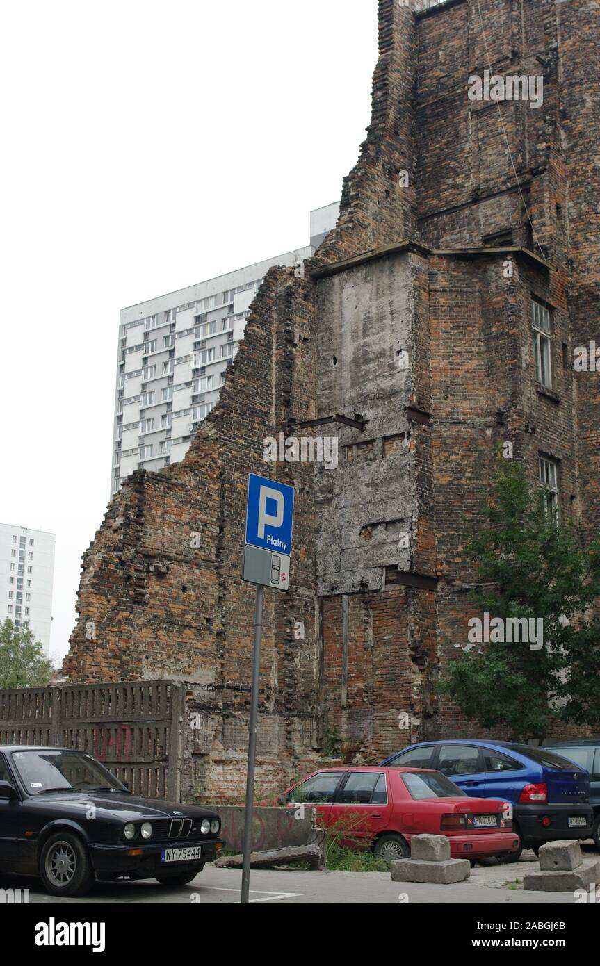 The ruins of an old house and a modern block of flats, Warsaw, Poland Stock Photo