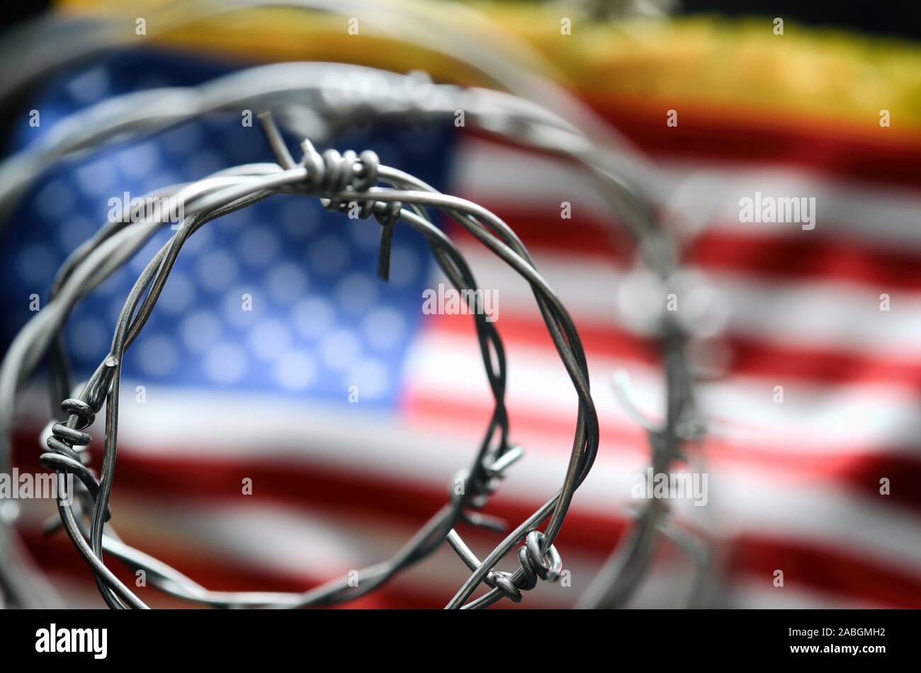 Barbed wire and United States of America flag , immigration concept