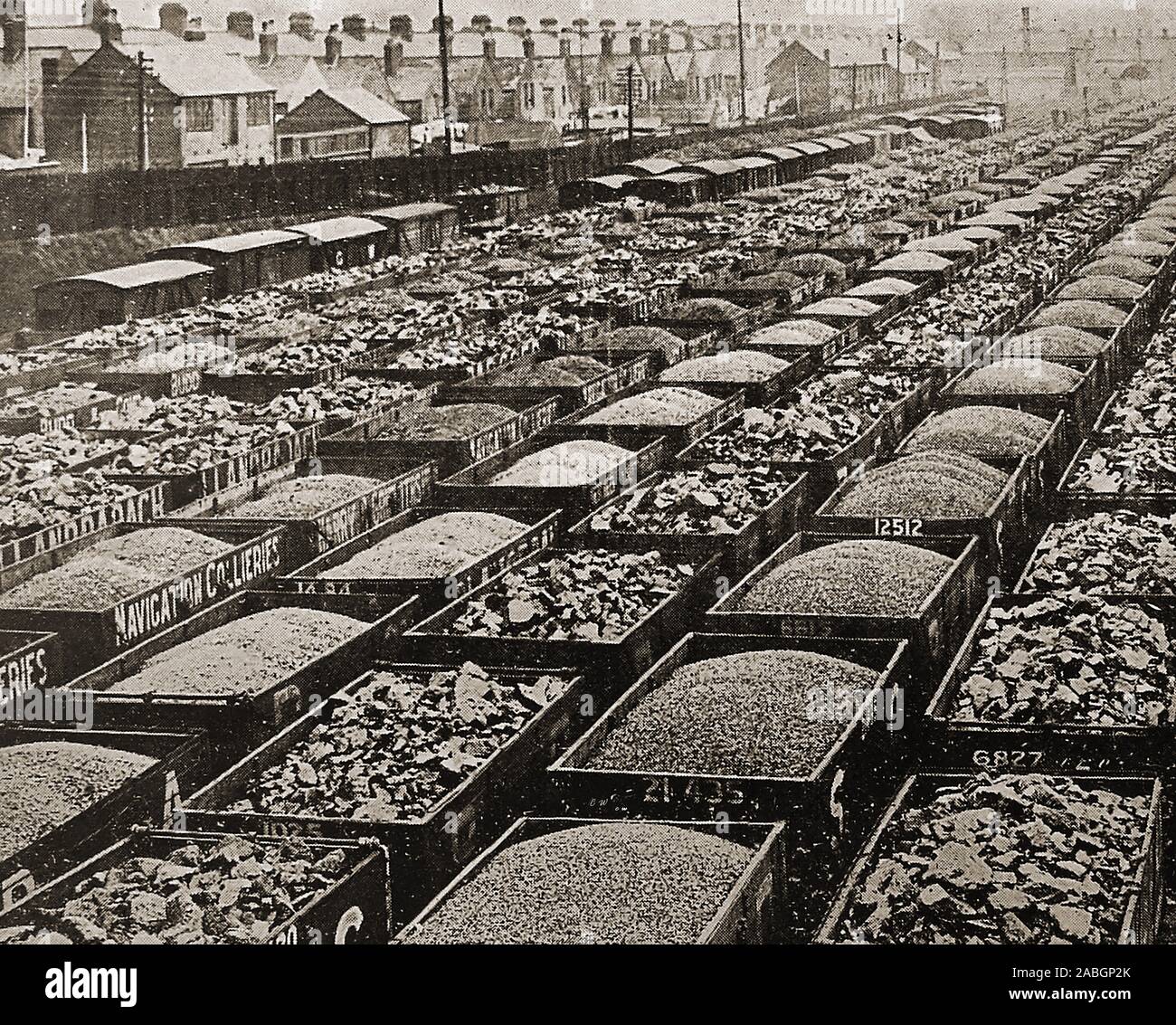 c1945 South Wales railway sidings with open wagons  filled with various grades of coal ready for delivery or export by train. Stock Photo