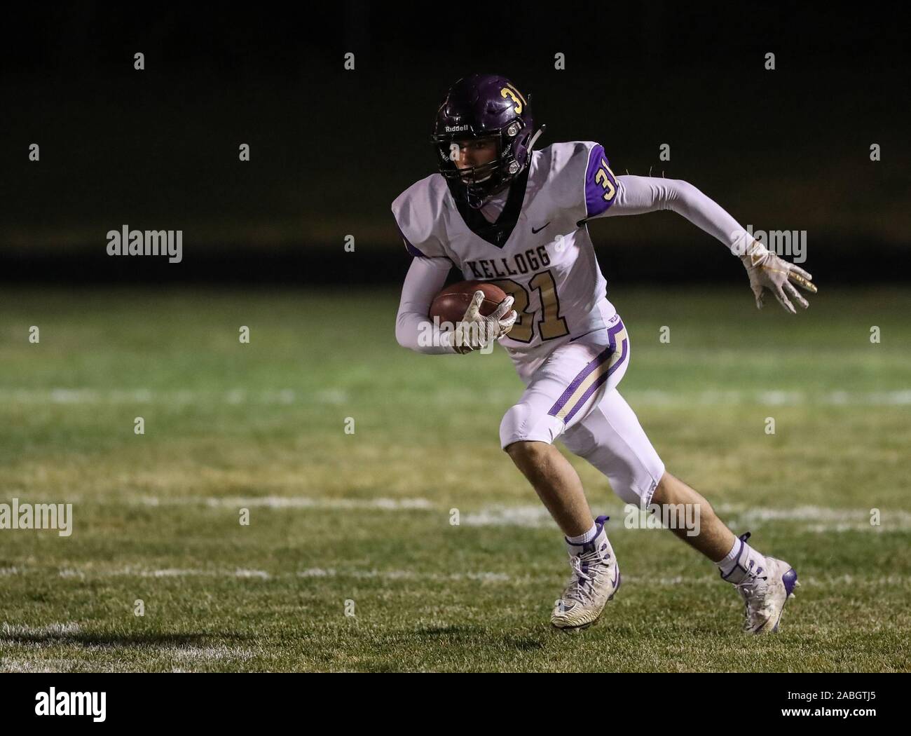 Varsity football action with Kellogg vs Timberlake High School in