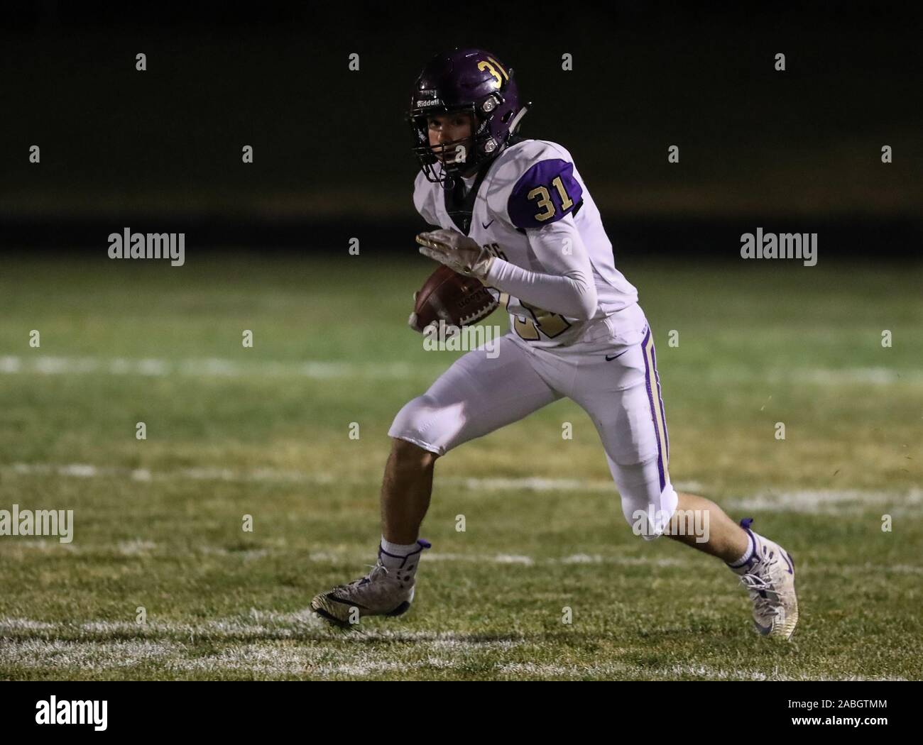 Varsity football action with Kellogg vs Timberlake High School in