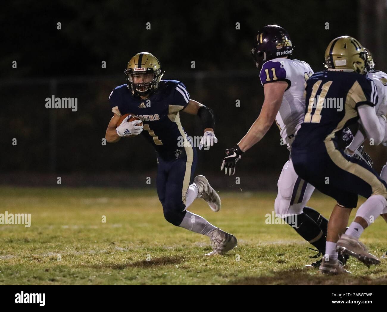 Varsity football action with Kellogg vs Timberlake High School in
