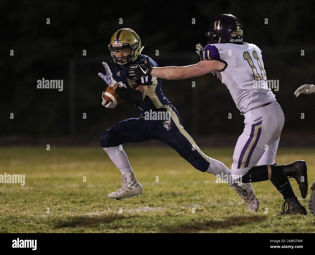 Varsity football action with Kellogg vs Timberlake High School in