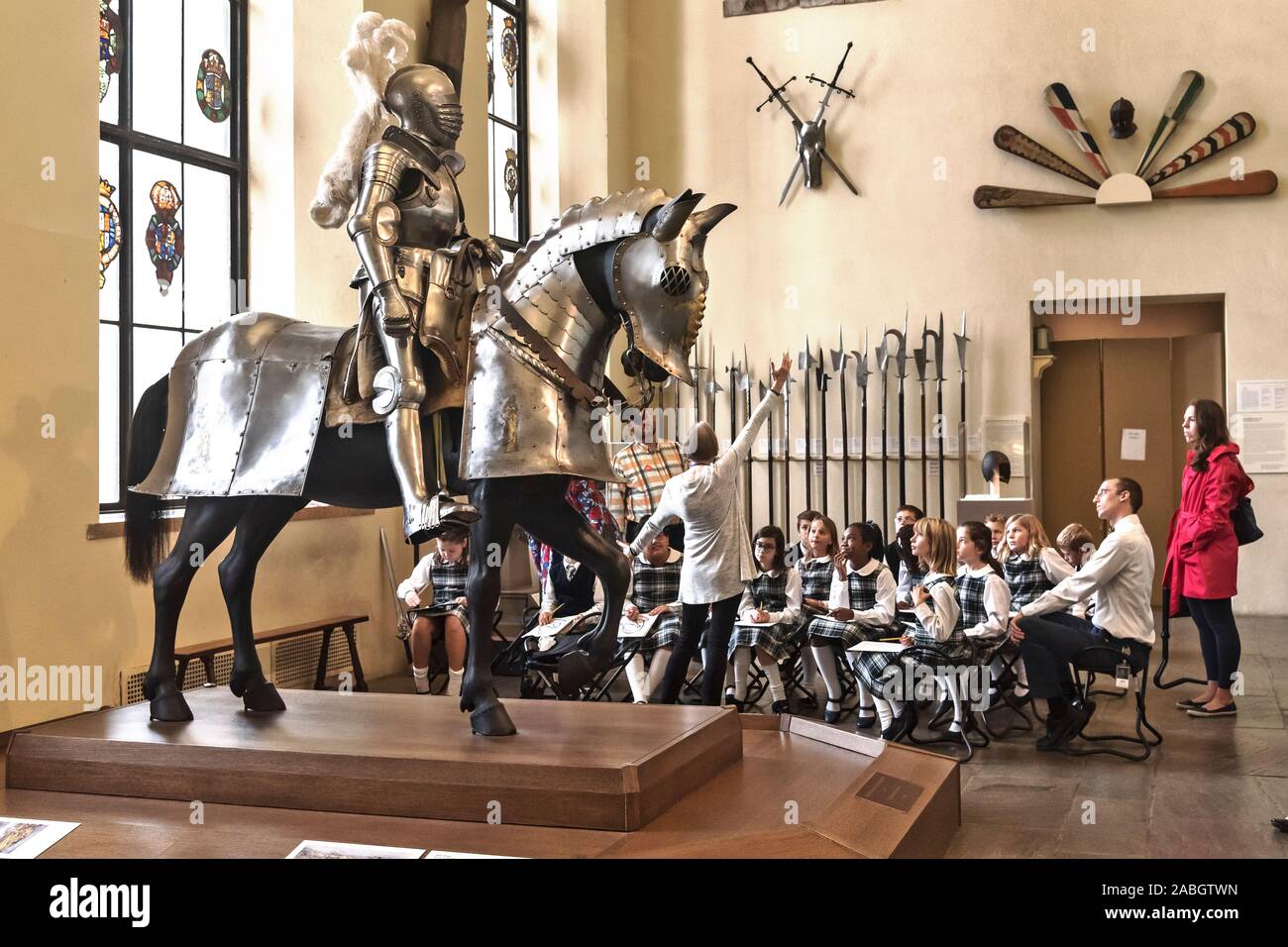 Museum lesson for school students at arms and armor room, Philadelphia Museum of Art, PA, USA Stock Photo