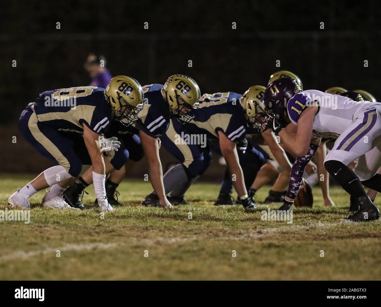 Varsity football action with Kellogg vs Timberlake High School in