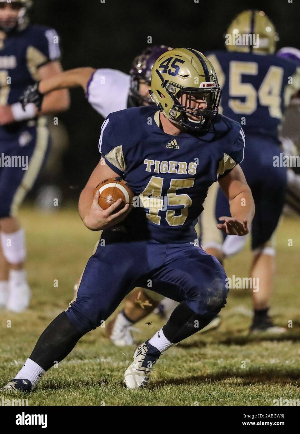 Varsity football action with Kellogg vs Timberlake High School in