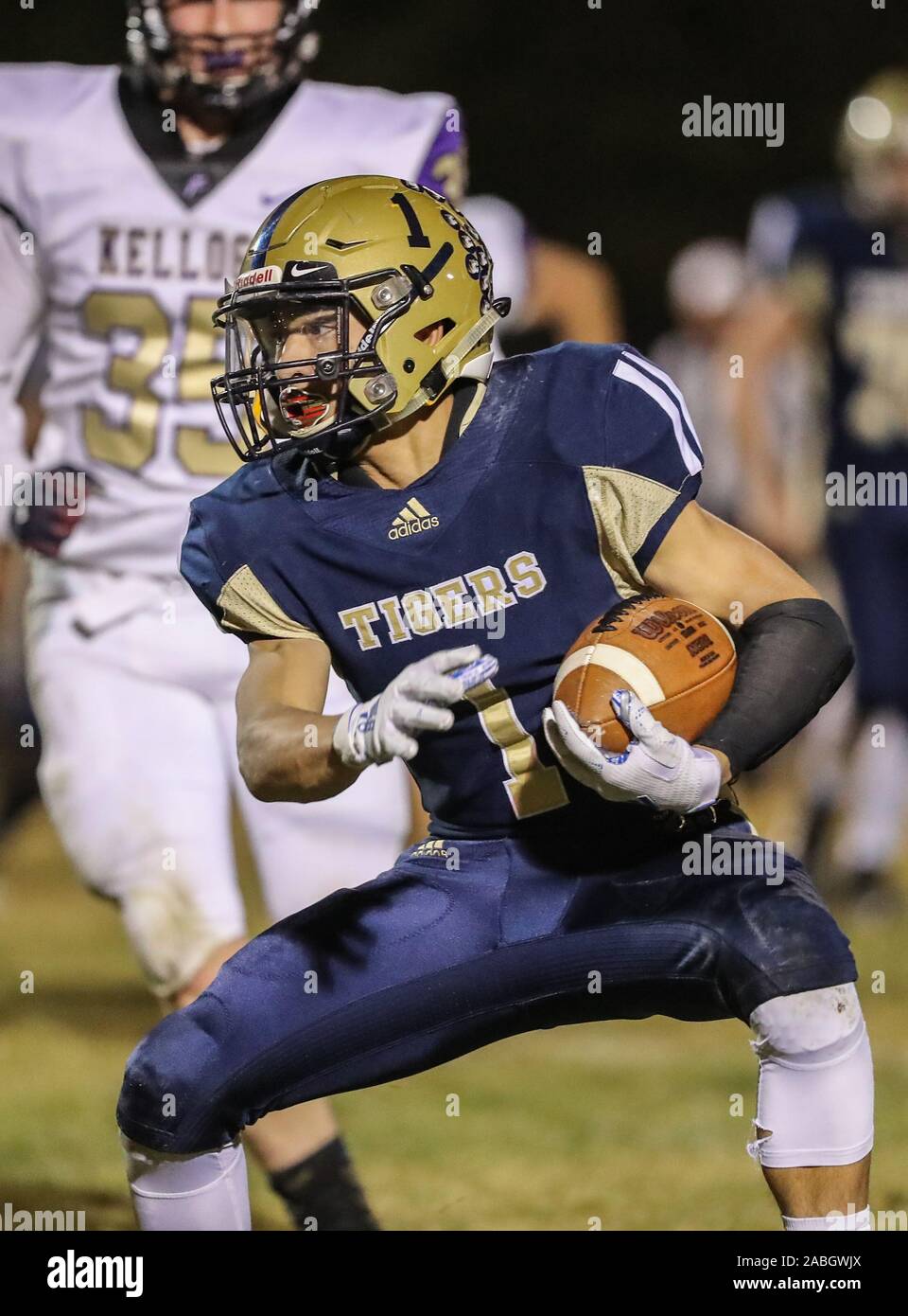 Varsity football action with Kellogg vs Timberlake High School in