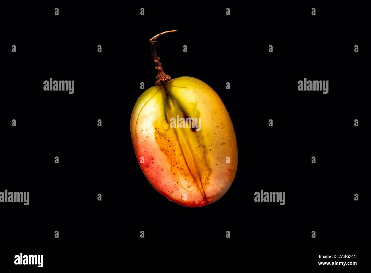 Sliced Grape with Backlight Isolated on Black Background Stock Photo