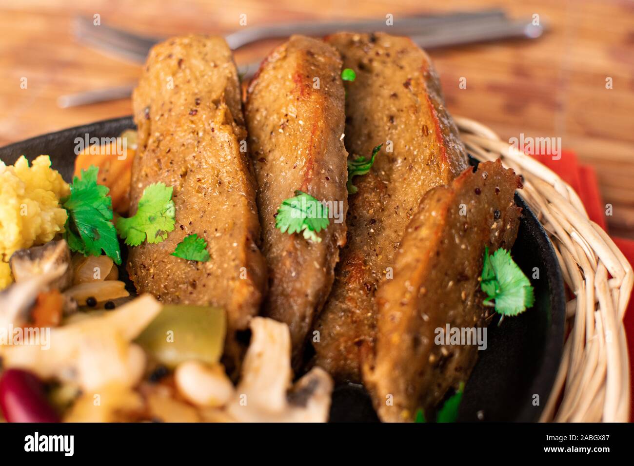 Grilled seitan slices, closeup Stock Photo