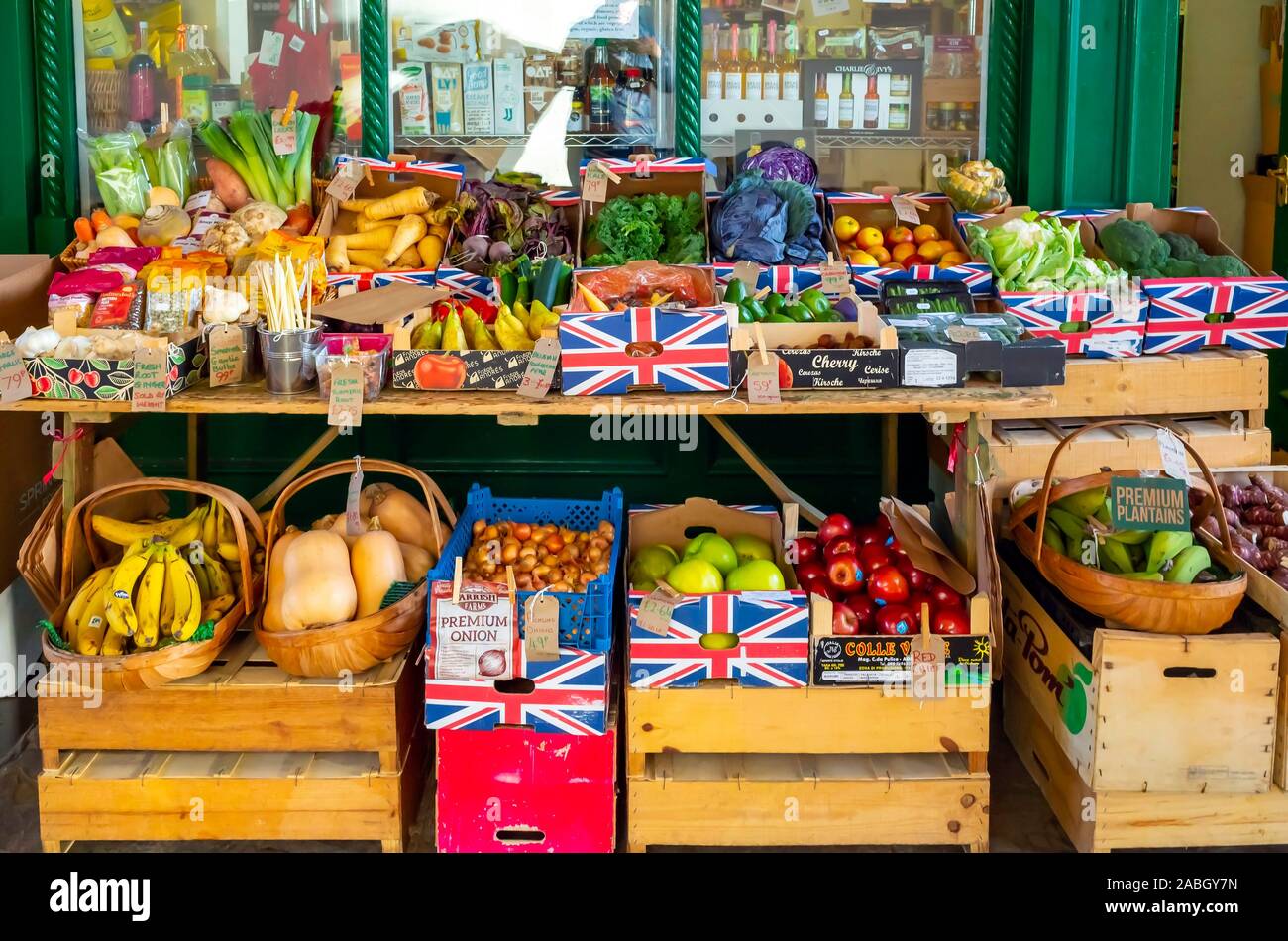 An attractive display of winter fruit and vegetables with 2019 price tickets in a greengrocer's shop in North Yorkshire Stock Photo