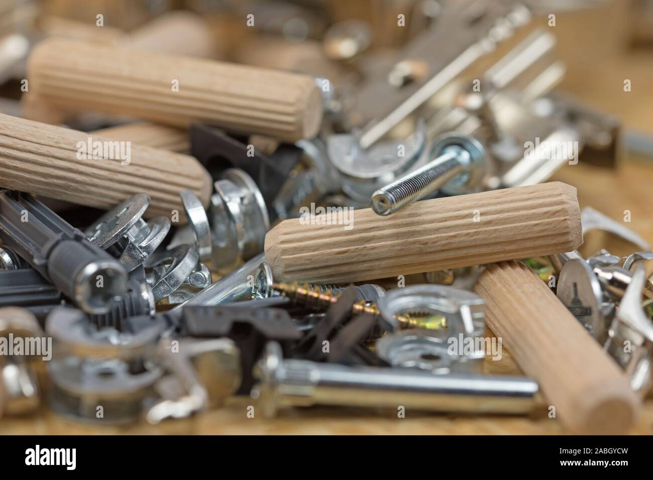 Various furniture fittings and assembly utensils in a closeup Stock
