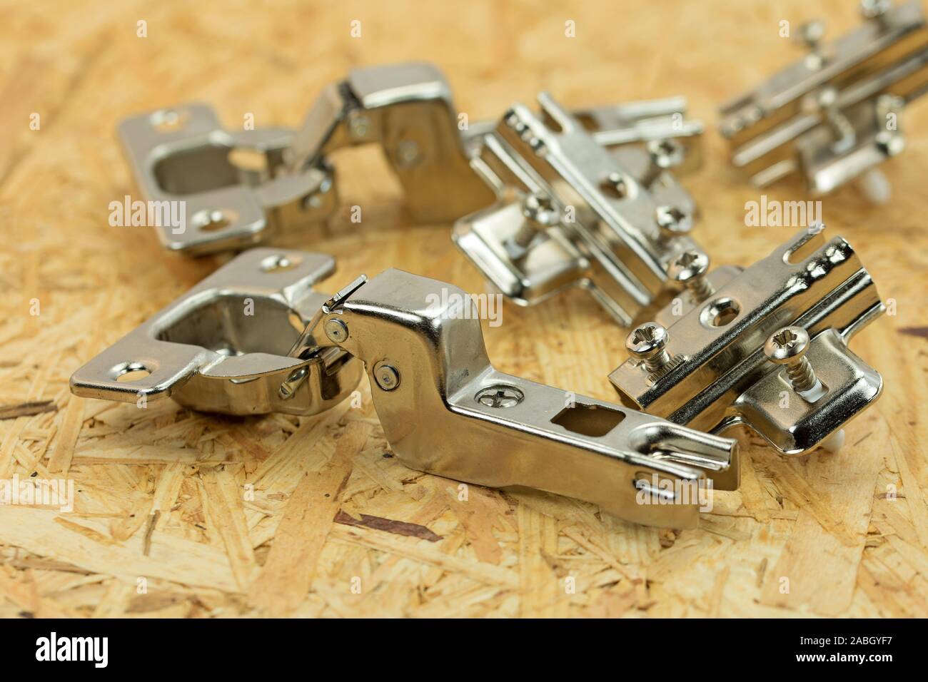 Concealed hinges for furniture construction Stock Photo Alamy