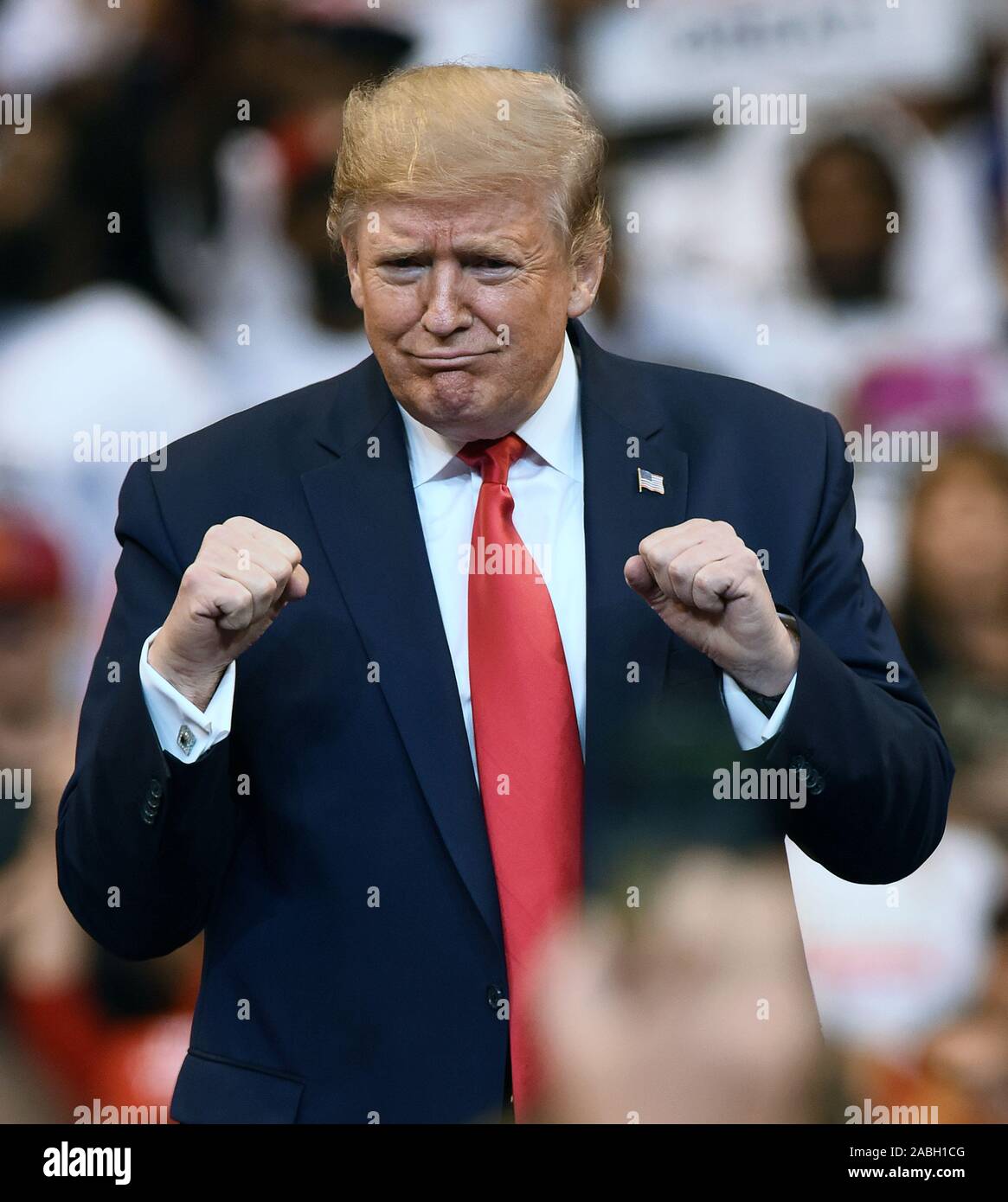 U.S. President Donald Trump gestures to the audience as he arrives on ...