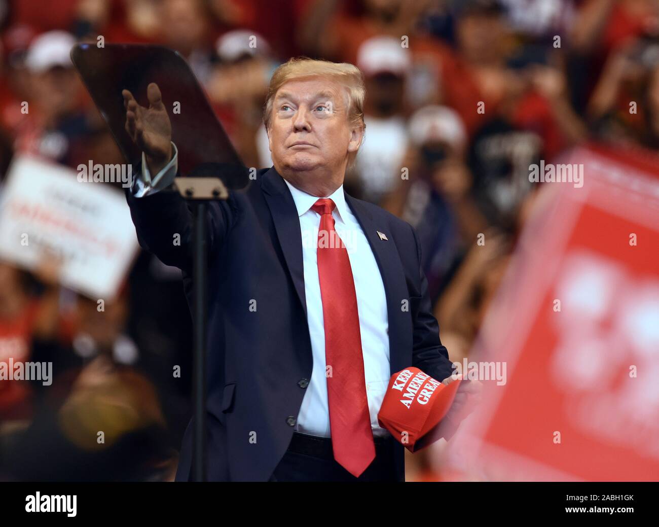 U.S. President Donald Trump throws Keep America Great hats into the ...