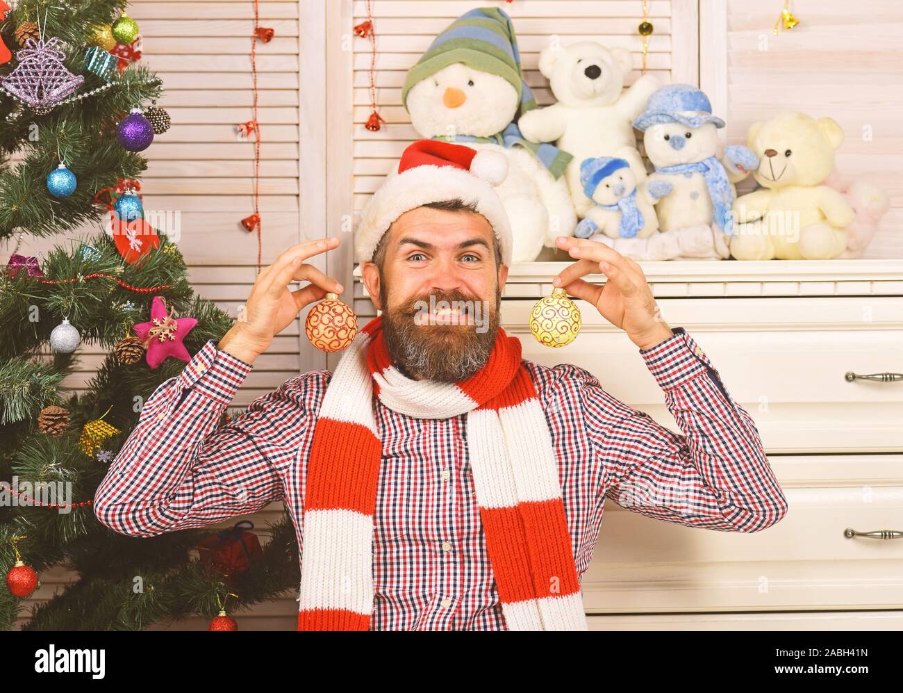 Santa Claus With Happy Face Near Wooden Wall Bureau And Christmas