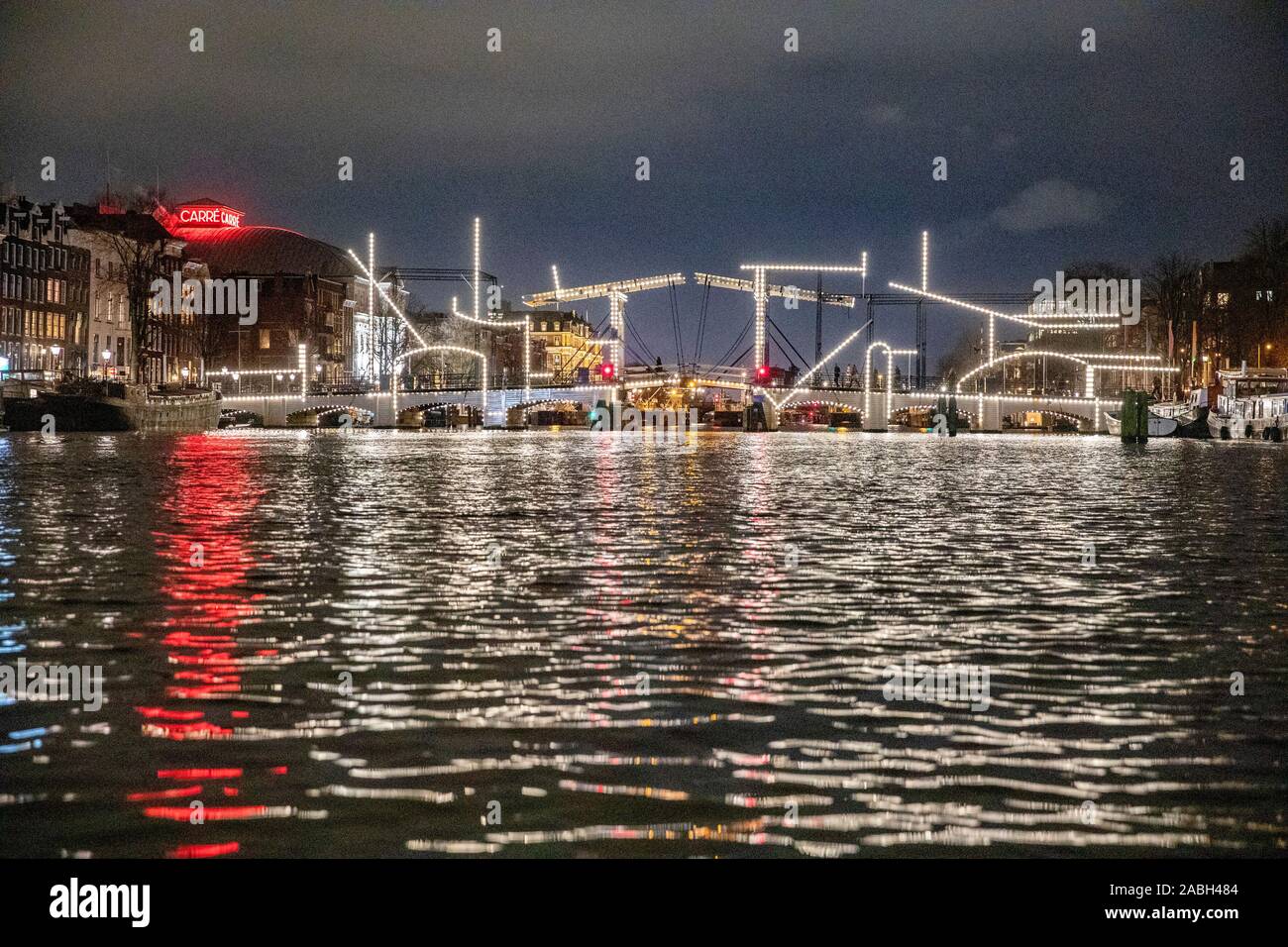 Amsterdam, Netherlands. 27th Nov, 2019. AMSTERDAM, Centre, 27-11-2019, The eighth edition of Amsterdam Light Festival. Experience the open-air exhibition 'DISRUPT!' from the Amsterdam waters and visit one of the many light art activities during the eighth edition of Amsterdam Light Festival! From 28 November 2019 to 19 January 2020 Amsterdam will again be the stage for international light art. Credit: Pro Shots/Alamy Live News Stock Photo