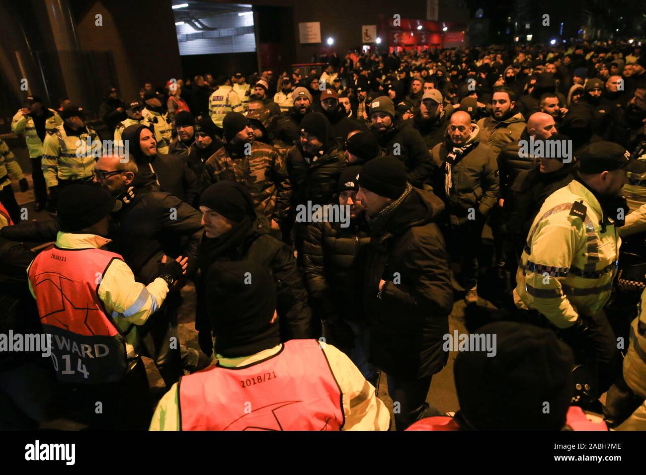 Anfield, Liverpool, Merseyside, UK. 27th Nov, 2019. UEFA Champions League Football, Liverpool versus SSC Napoli ; Napoli fans pass through the security cordon as they arrive at the stadium prior to the match - Editorial Use Credit: Action Plus Sports/Alamy Live News Stock Photo
