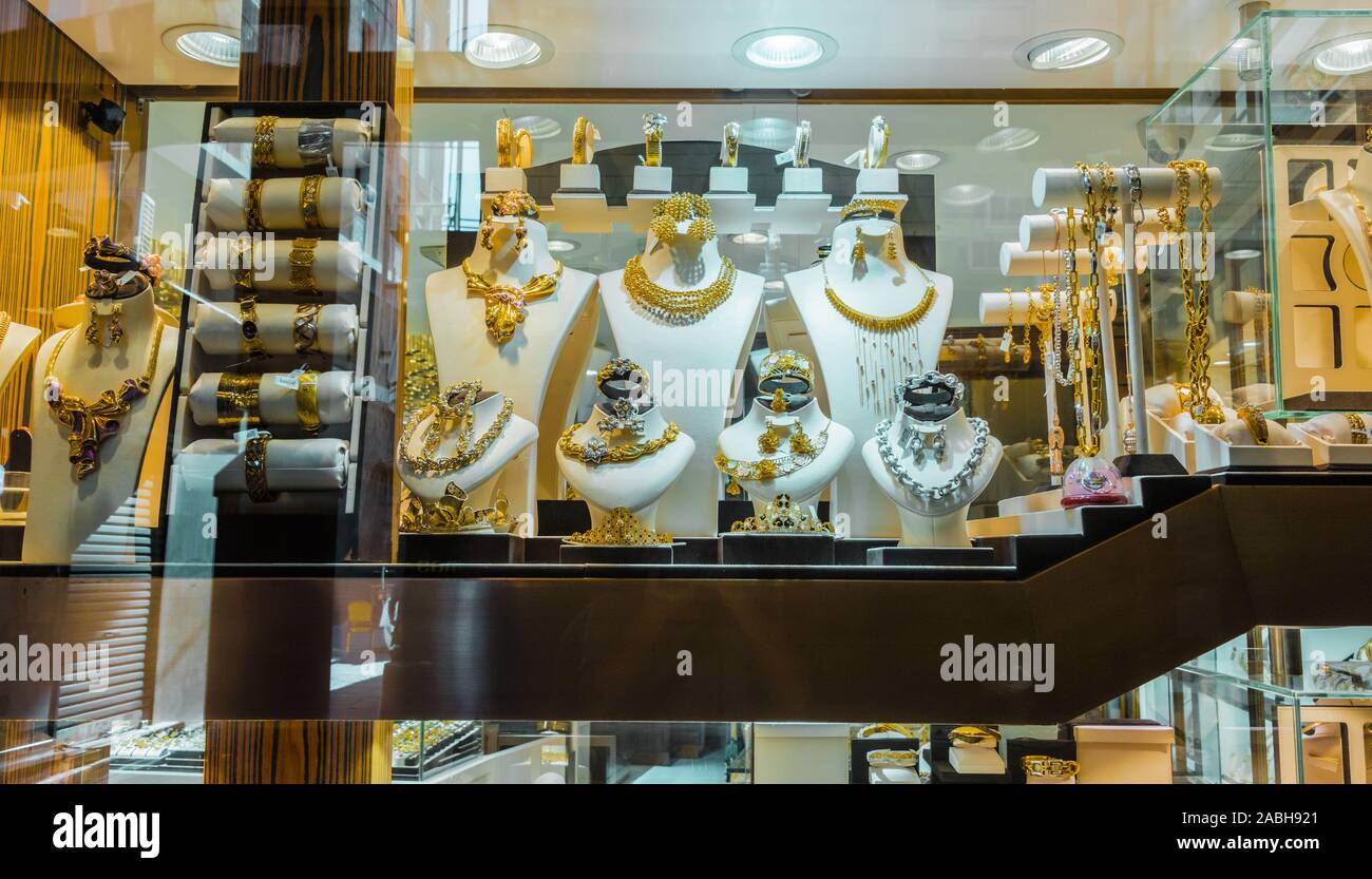 DUBAI, UNITED ARAB EMIRATES - FEB 7, 2019: Show window of a jewelry store in Dubai Gold Souk, United Arab Emirates. Stock Photo