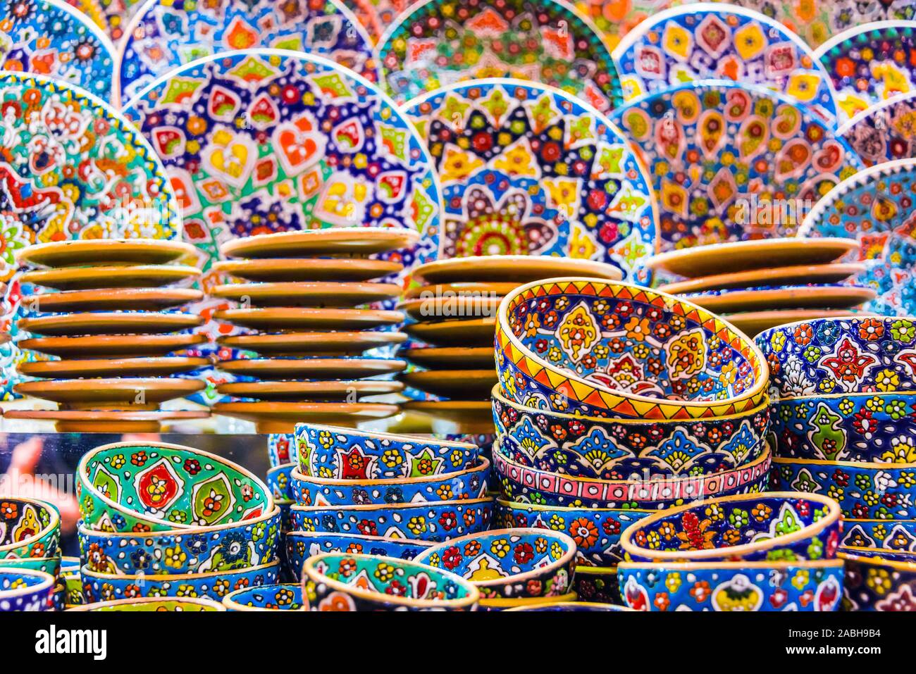Colorful pottery dishes sold in Dubai souk, Unied Arab Emirates Stock