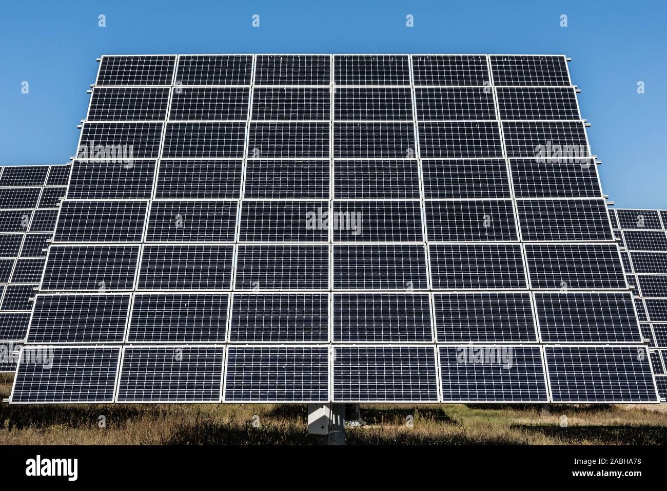 Rotary solar panel. Front - bottom view, clear sky Stock Photo